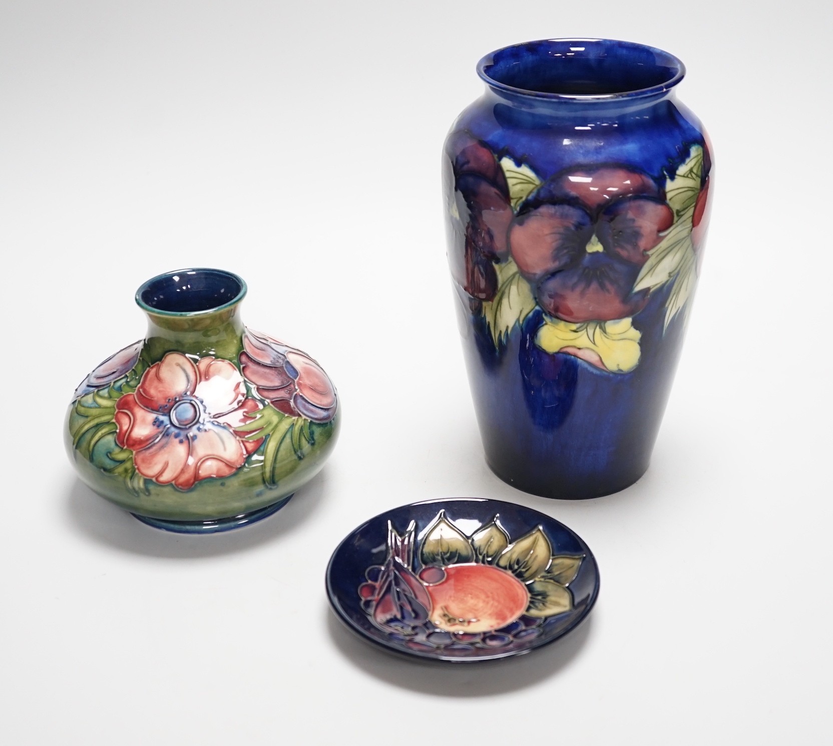 Two Moorcroft vases and a dish, tallest 20cm